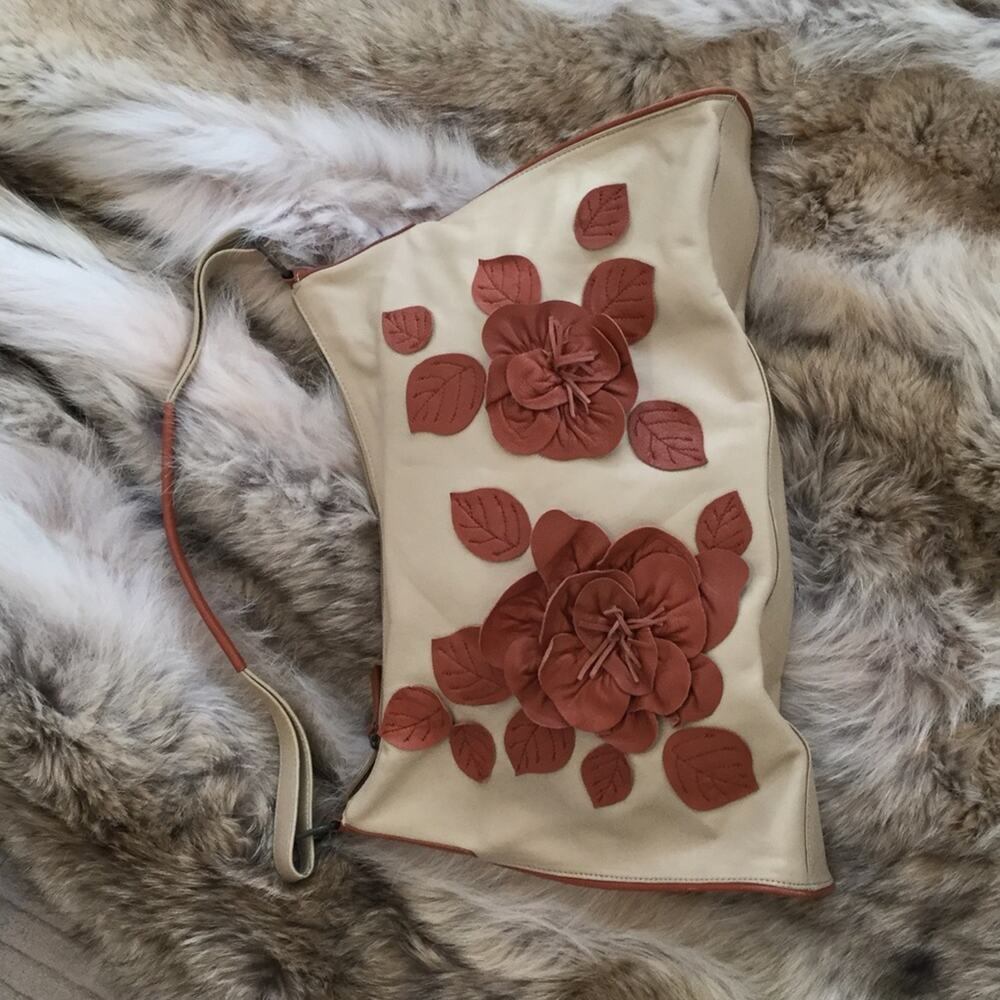 Bloomingdale’s tan/cognac leather purse w/ flowers